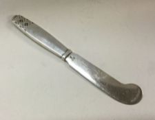 GEORG JENSEN: A heavy Danish silver butter knife.