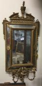 An Antique gilt framed mirror.