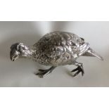 A good quality textured figure of a grouse. London