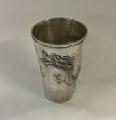 An unusual Chinese silver tapering beaker with dra