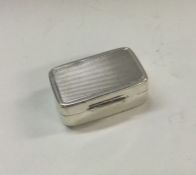 AN engine turned silver hinged box. Approx. 25 gra