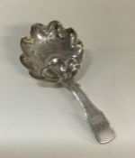 A George III bright cut silver caddy spoon. Birmin