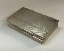 A heavy engine turned silver hinged box. Approx. 5