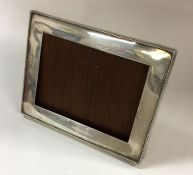 A heavy Sterling silver frame. Marked to back. App
