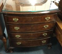 A good bow fronted chest of four drawers.