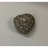 A Victorian silver heart shaped box. Approx. 9 gra