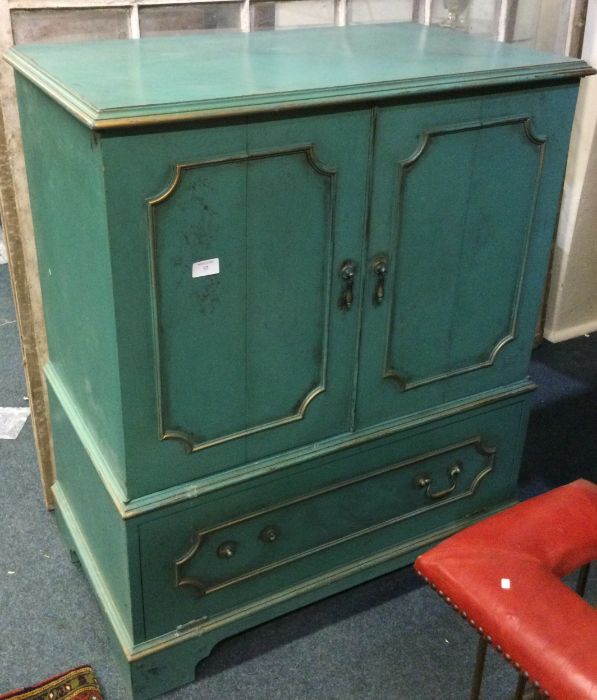 A retro painted television cabinet.