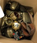A heavy box of brassware.