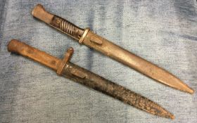 Two old Military daggers.