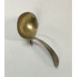 An unusual George III silver caddy spoon. London 1