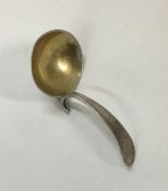 An unusual George III silver caddy spoon. London 1