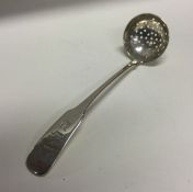 SCOTTISH PROVINCIAL: A crested silver sifter spoon