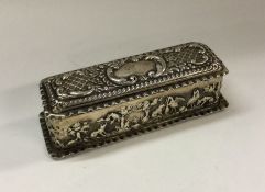 A chased silver box decorated with animals. Birmin