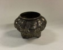 A panelled Chinese silver bowl on feet. Marked to