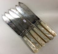A set of six Victorian silver fish knives. London