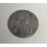 A German silver coin dated 1780. Approx. 28 grams.