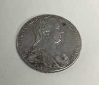 A German silver coin dated 1780. Approx. 28 grams.