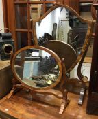 Two mahogany toilet mirrors.