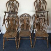 A good set of eight stick back chairs.