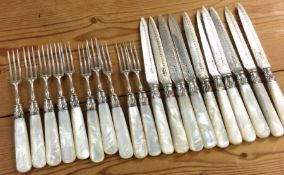 A fine set of ten (plus ten) Victorian silver kniv