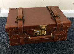 A good quality leather cartridge case with fitted