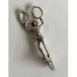An unusual paid of sugar scissors in the form of a