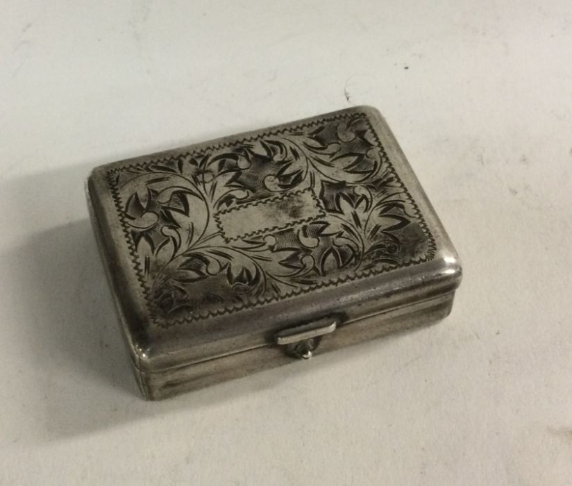 A small hinged top silver pill box. Approx. 18 gra