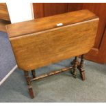 A mahogany drop leaf table.