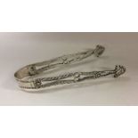 An extremely rare Provincial silver pair of tongs.