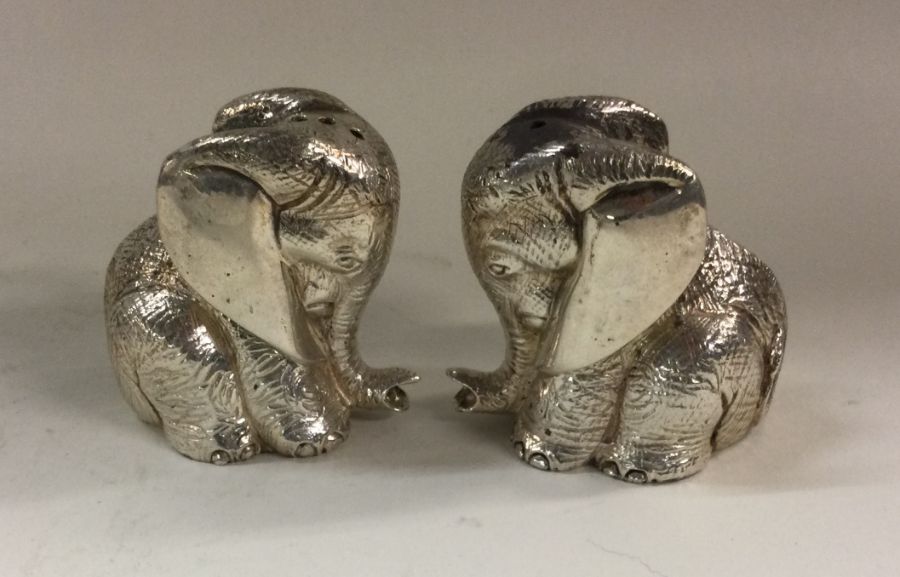 An unusual cast pair of peppers in the form of ele