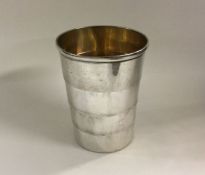 A large cased collapsible silver beaker in origina
