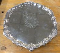 A George III crested silver salver on three hoof f