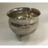 An Arts and Crafts silver bowl on ball feet. Londo