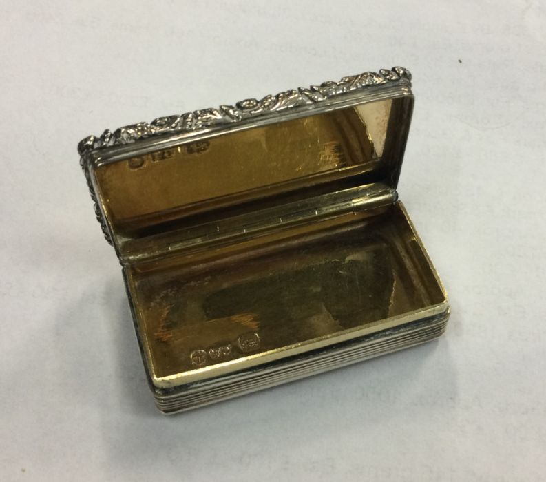 A large William IV silver snuff box with chased de - Image 2 of 2