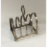 An Edwardian silver toast rack / smartphone dockin
