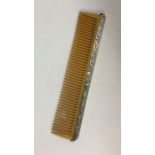 A Chinese silver comb. Approx. 60 grams. Est. £30