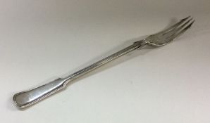 A large heavy silver pickle fork. Sheffield 1930.