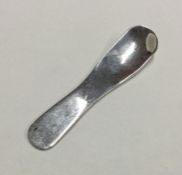 A stylish silver caddy spoon. London. By TP. Appro