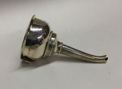A Georgian style silver wine funnel with scroll th