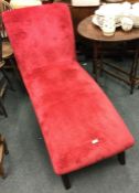 A red tapestry sofa.