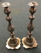 A large pair of Judaica silver candlesticks with c