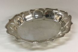 A stylish pierced silver dish. London. Approx. 91