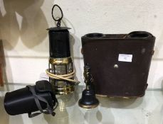 An old minors lamp together with binoculars etc.