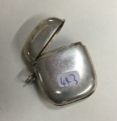 A large heavy oval silver vesta case with hinged t