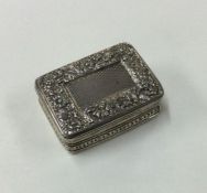 A heavy George III silver vinaigrette with chased