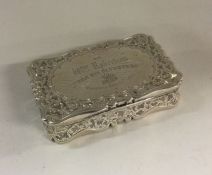A heavy Victorian silver snuff box with cast rim.