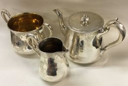 A fine quality three piece Victorian silver tea se