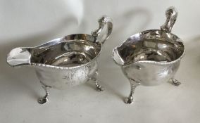 A good pair of Georgian silver sauceboats with cre