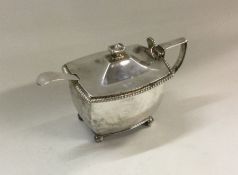 A heavy George III silver mustard pot. London 1808