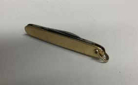 A 12 carat gold plated pen knife. Approx. 17 grams